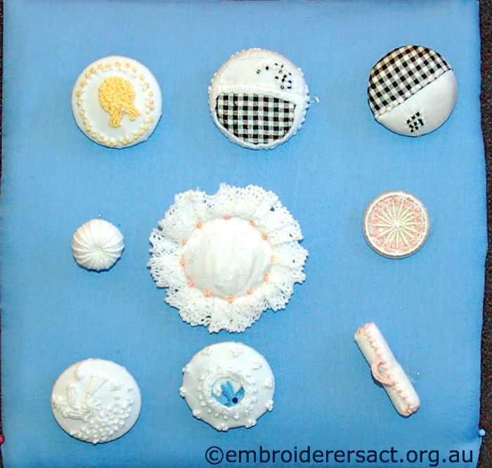 Embroidered buttons