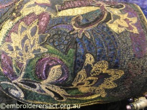Chest lid in gold green and purple by Carol Pichelman