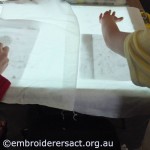 Young stitchers using lightbox