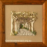 Framed version of Garden Avenue designed & stitched by Pat Bootland