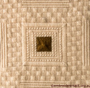 Detail 1 of Brown and Cream Aran Cushion stitched by Audrey Schultz