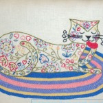Crewel Cat Footstool stitched by Marjorie Gilby