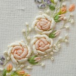 Detail Silk ribbon roses on embroidered heart in Collection