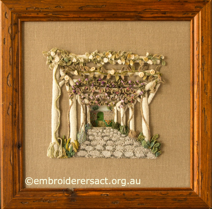 Framed version of Garden Avenue designed & stitched by Pat Bootland